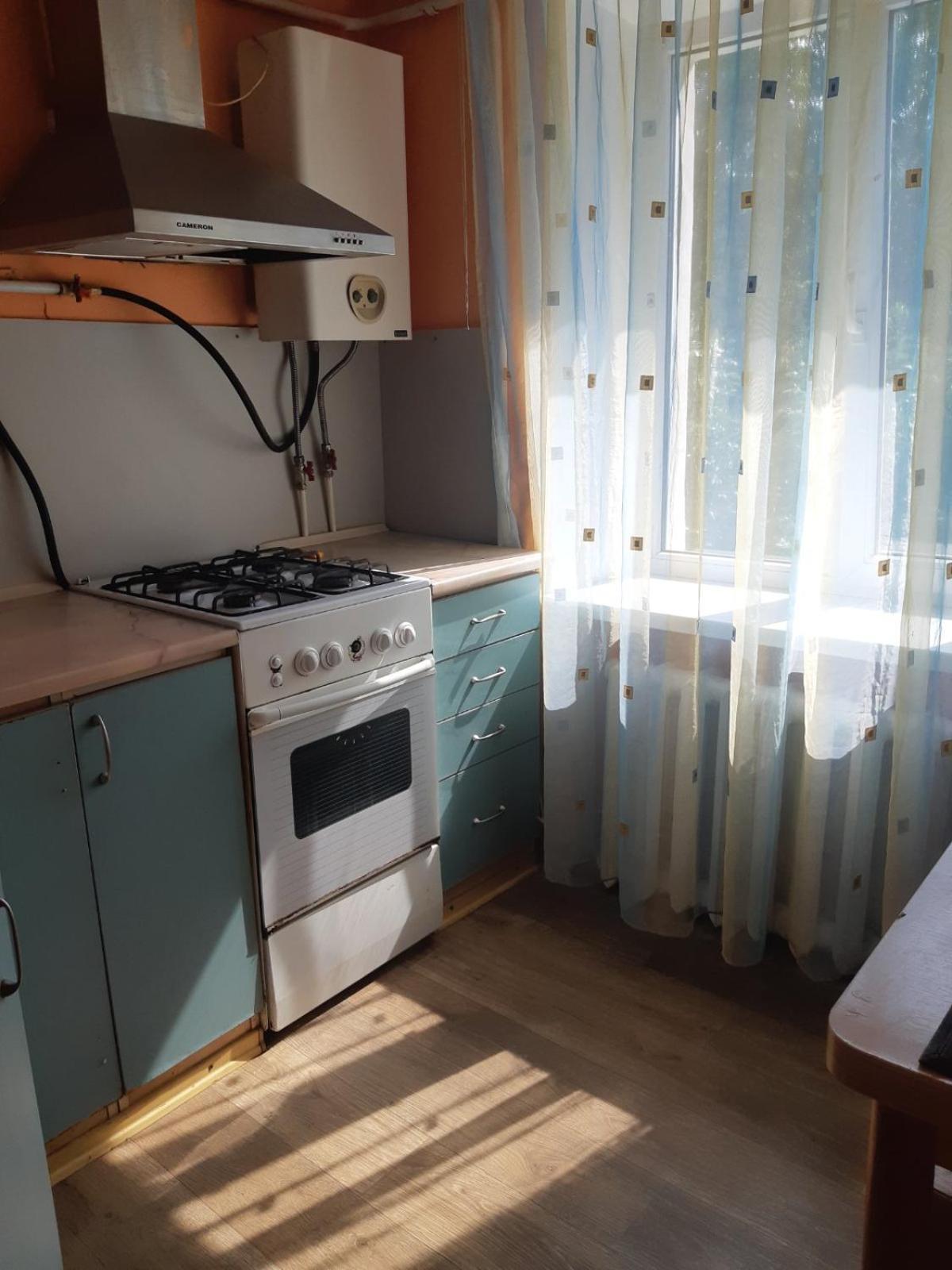 Воскресенская 12 ドニプロペトロウシク 部屋 写真